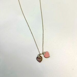 Tiffany & Co. Return to Tiffany Pink Double Heart Tag Pendant
in Silver